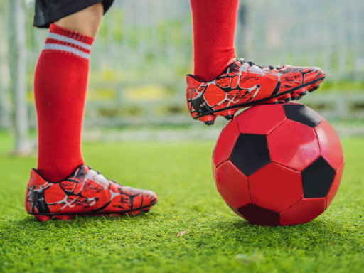 soccer-player-is-wearing-red-shoes-to-kick-the-ball