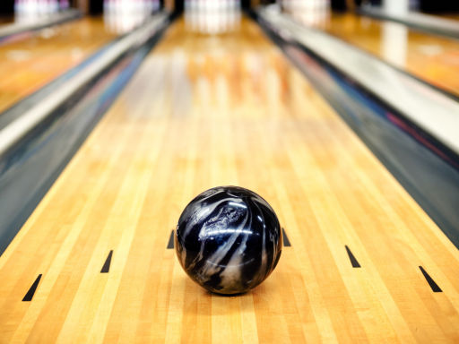 family-enjoying-bowling-game