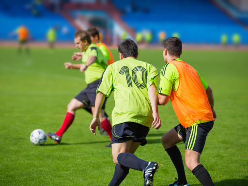 Soccer players are playing soccer