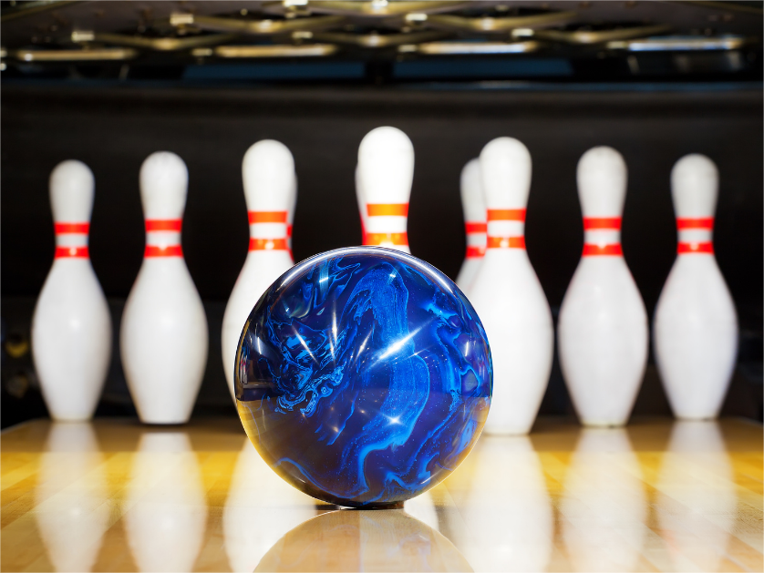 ten-pin-bowling-and-blue-bowling-ball