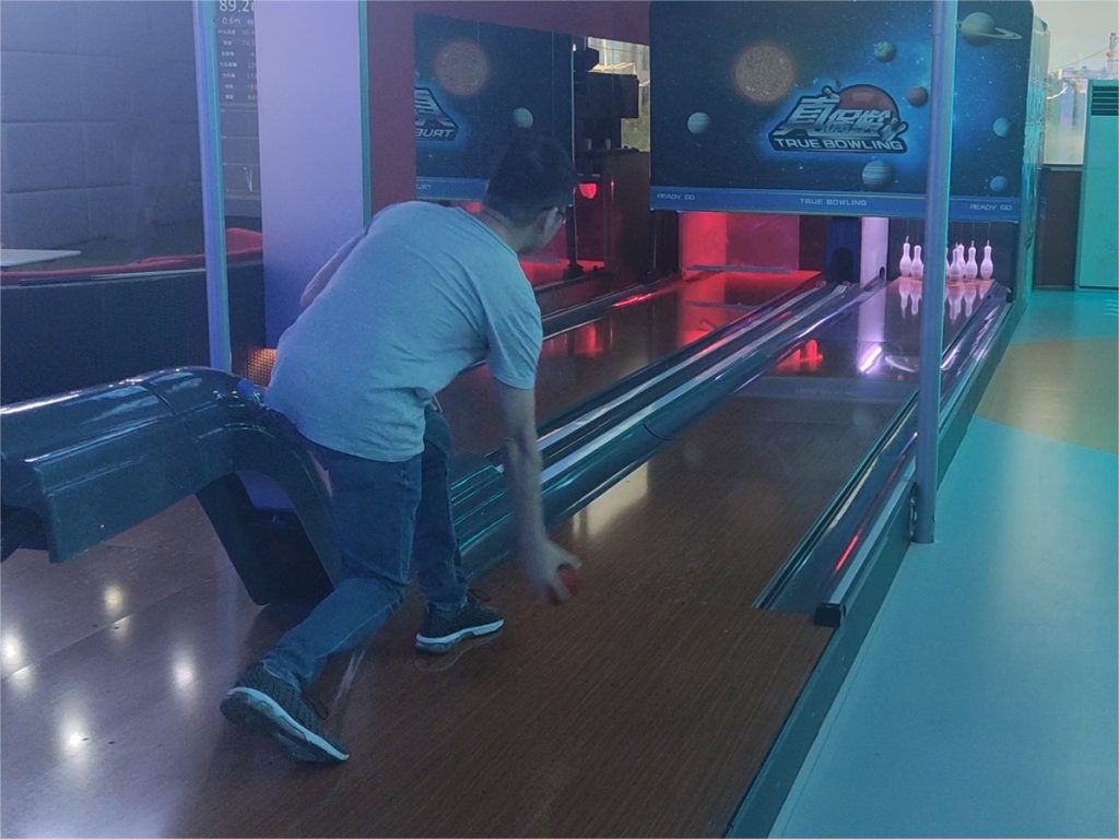 players-playing-CHFUNTEK-mini-bowling